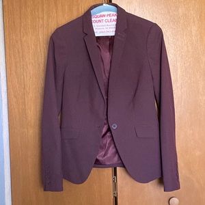 Three piece suit includes matching skirt, jacket, and sheath dress.